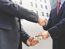 A former Director of Corporate Banking at the First Bank of Nigeria (UK) is facing bribery charges