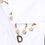 Thumbnail: Dolce & Gabbana White Cotton DG Logo Pearl Chain Formal Shirt