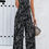 Thumbnail: Geo Print Smocked Sleeveless Pockets Jumpsuit