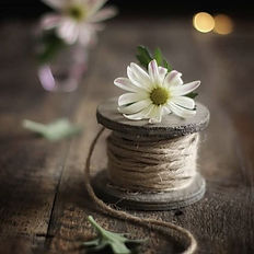 Children’s Sewing Craft Workshop | Learn to Stitch & Gift with Love | Somers Legacy Wellness | spool of thread with flower on top