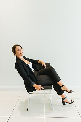 Me on chair kicked back.jpeg