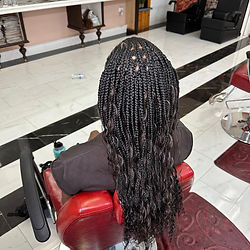 Tribal Braids or Cornrows with Style designed to give you a trendy and eye-catching hairstyle.