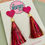 Thumbnail: Pink Tassel Heart Glitter Resin Earrings