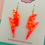 Thumbnail: Large Neon Orange Glitter Lightning Bolt Earrings