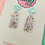 Thumbnail: White and purple window glitter earrings
