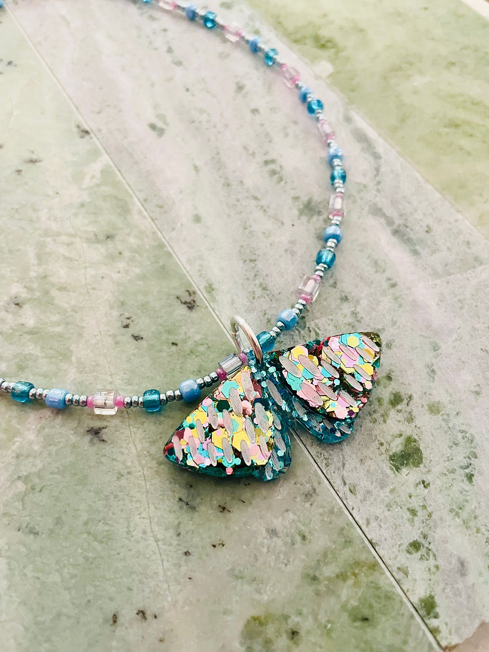 Thumbnail: "Midnight Flutter" Mixed Bead Necklace — Blue & Pink with Moth Charm