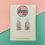 Thumbnail: White and purple window glitter earrings
