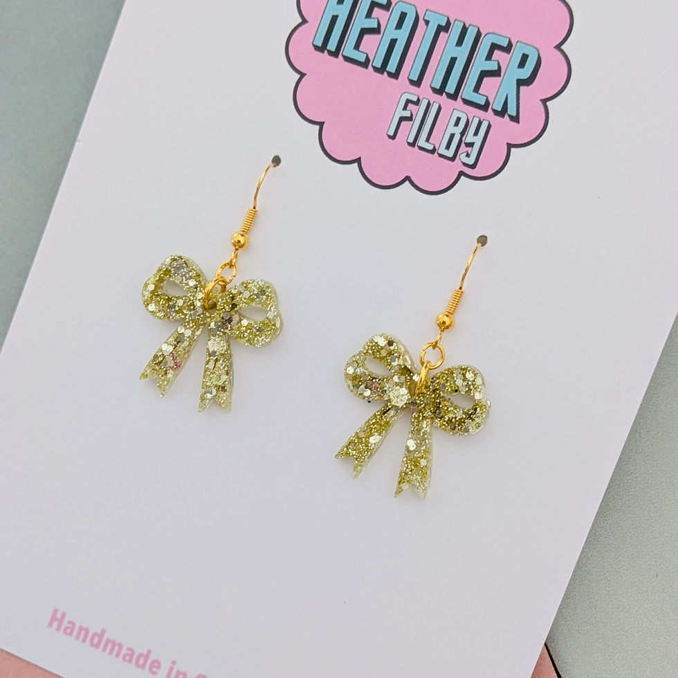 Thumbnail: Red Glittery Small Bow Earrings