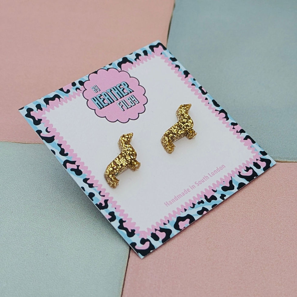 Thumbnail: Gold glitter sausage dog studs