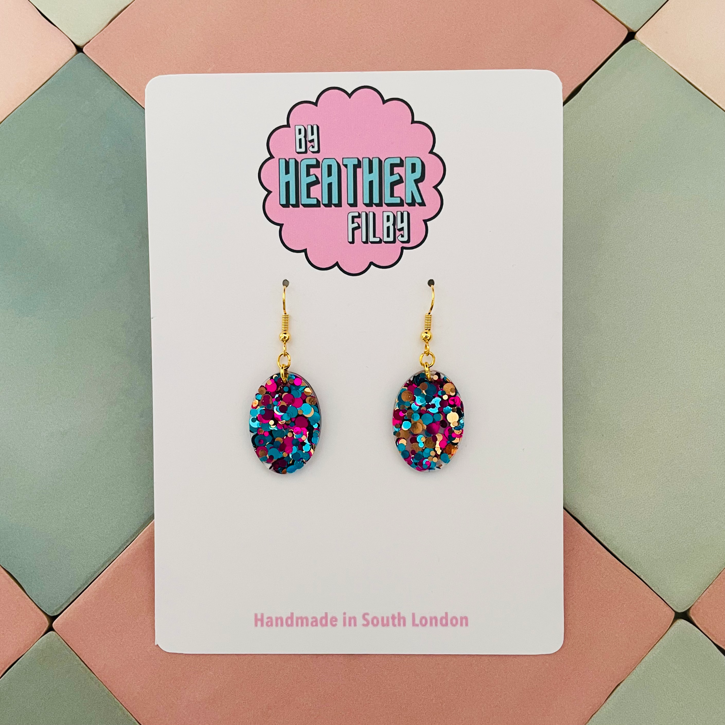 Delicate glitter resin oval earrings