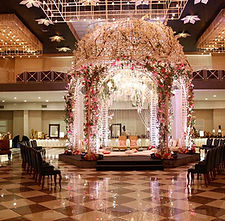 Luxury wedding venue in Chattarpur with lavish outdoor lawns and indoor banquets; designed for weddings, pre‑wedding functions and social events.