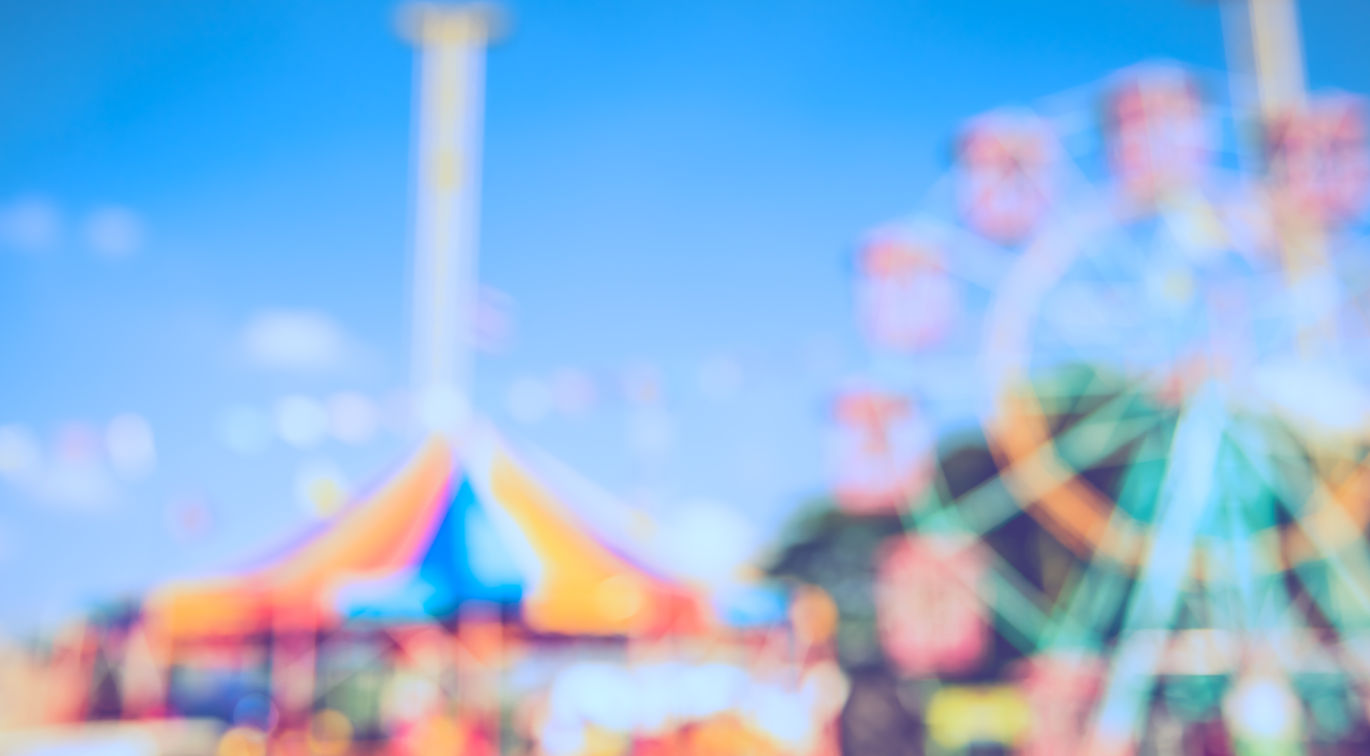 Vintage tone Abstract Blurred image of Theme park on day time with bokeh for background us