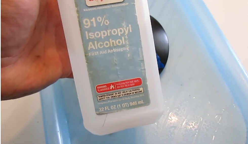 Spray the alcohol on the solar panel for a final clean