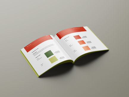 A magazine-like book features is laid open and features color swatches representing the brand