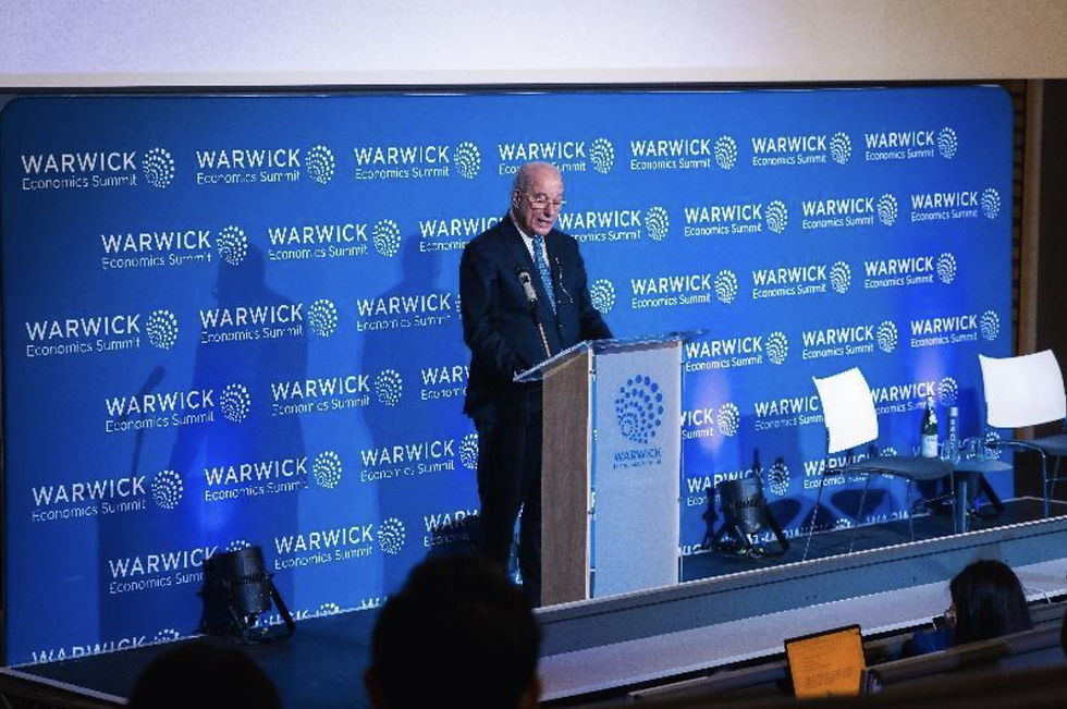 Mr Üzümcü giving a keynote speech at the Warwick Economics Summit (January 2025)