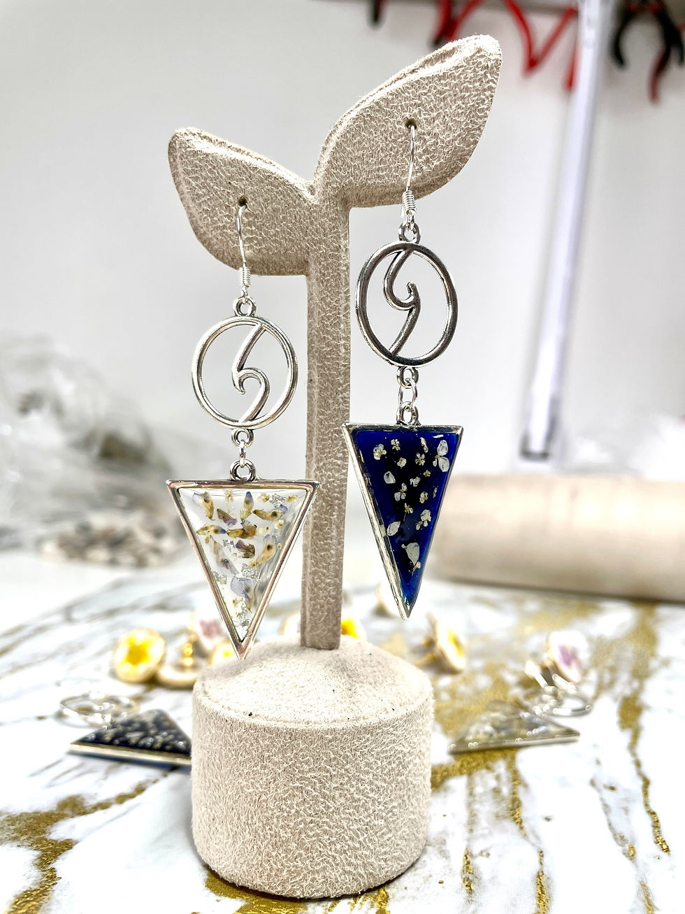 Thumbnail: Mix of two dangling earrings clear or deep blue color with blue or white drie flowers from the Upper Galilee