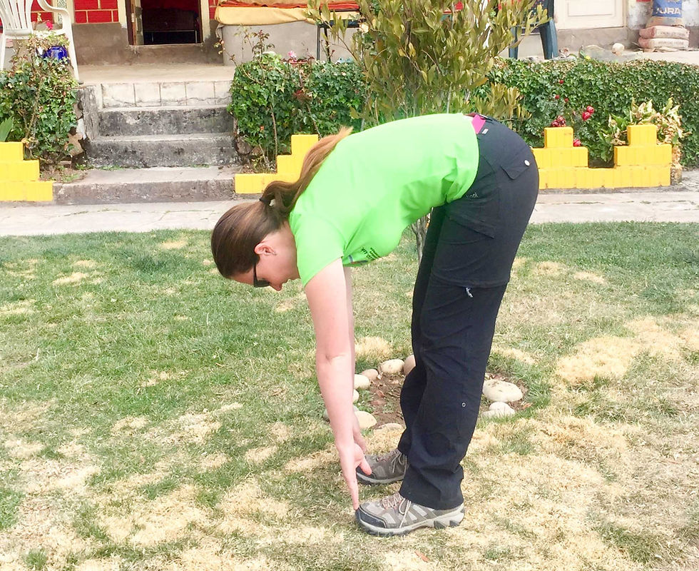 Lumbar and hamstring / touch toes stretch. AvVida.co.uk - Suzie Says...