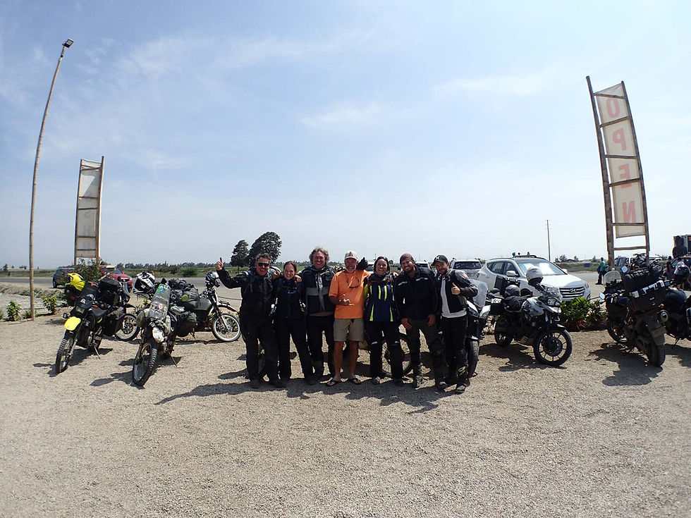 Kelvin, Suzie, Michnus, Roy, Elsebie, Sata, Mateo (left to right) chilling out roadside.
