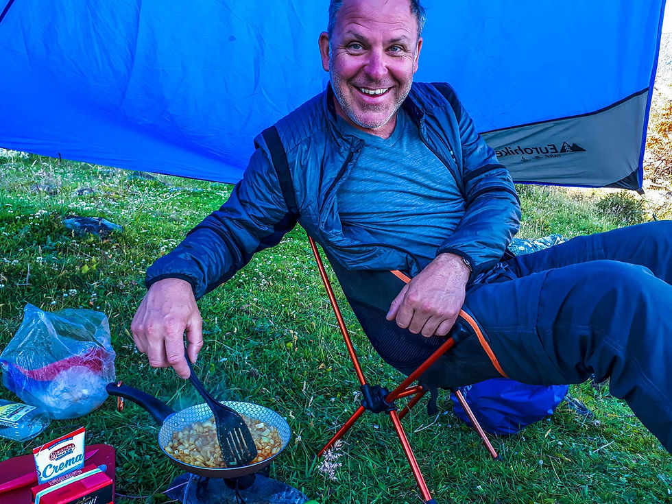 Kelvin preparing our camp curry for dinner - AvVida.co.uk