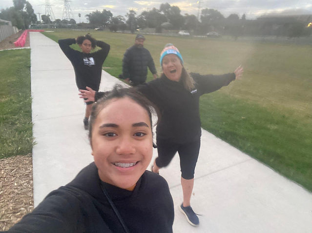 Groupshot of three people