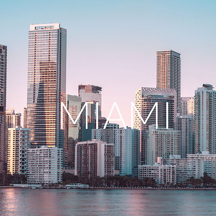 a view of a city skyline from a body of