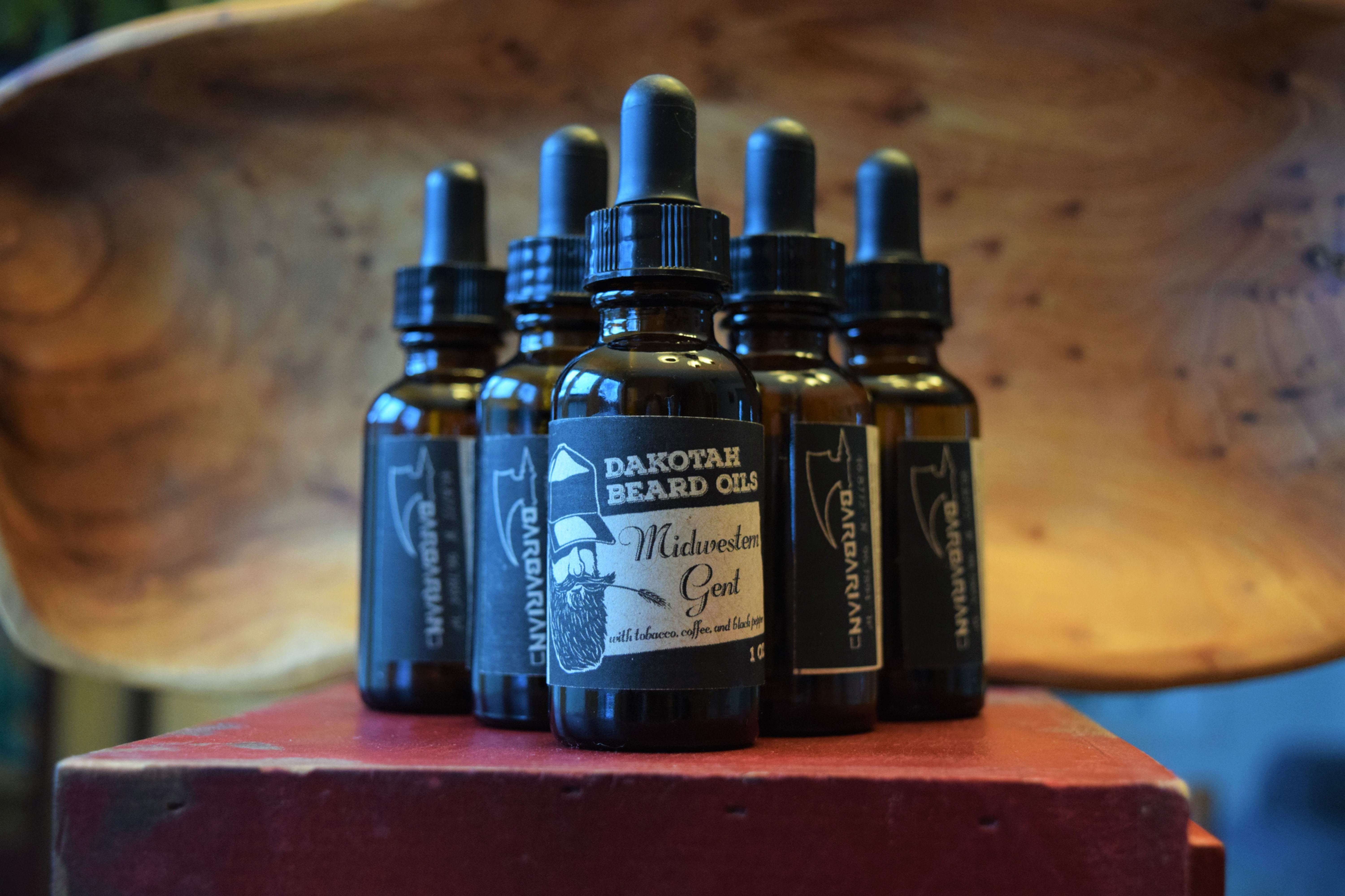Bottles of Dakotah Beard Oils, Midwestern Gent scented beard conditioning oil