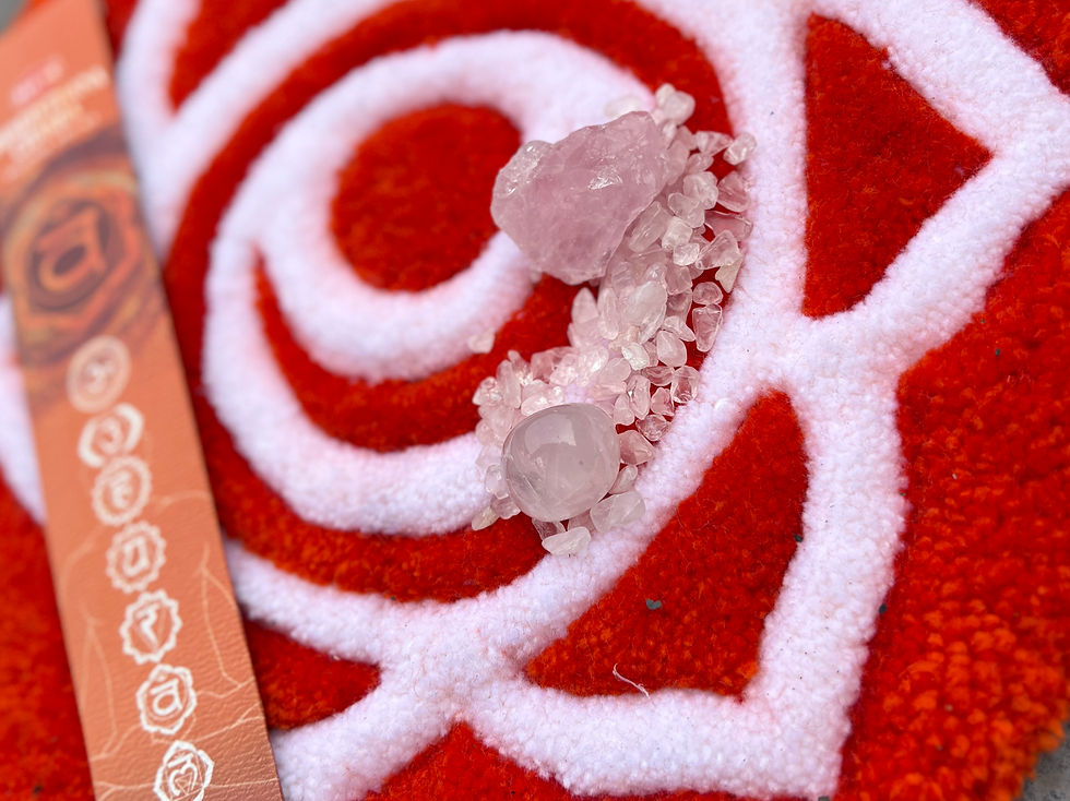 Thumbnail: close up of Sacral Chakra Hand tufted design with crystals and incense sticks. www.astralthreads.co.uk