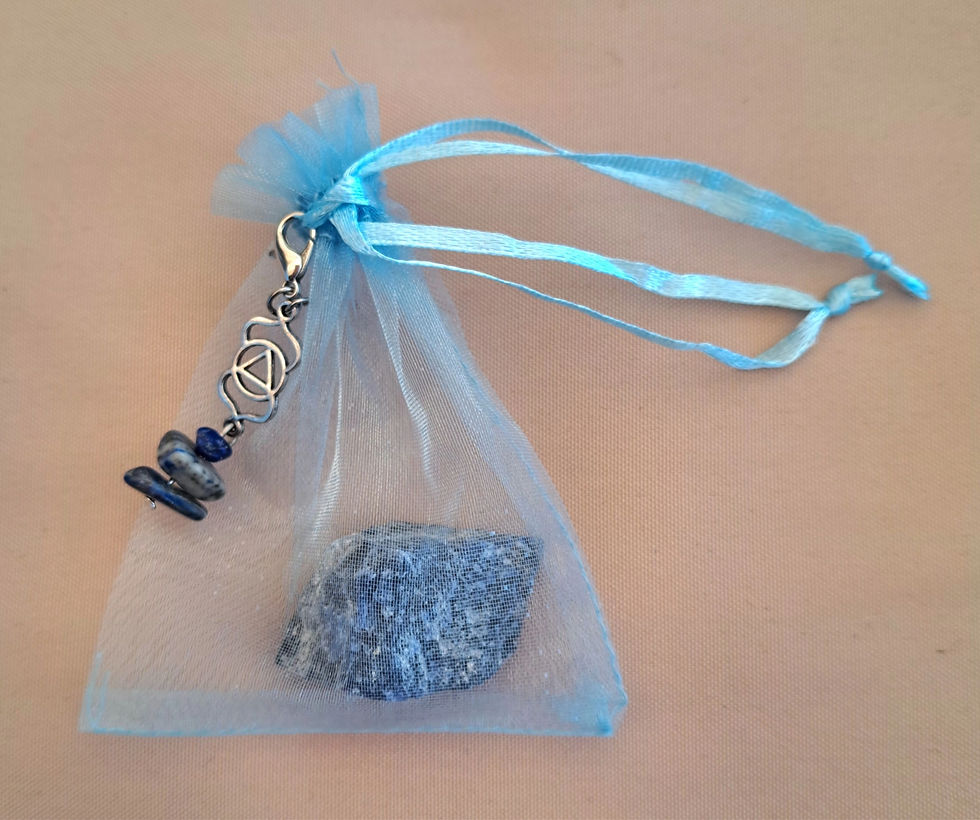Thumbnail: Third-Eye Chakra meditation accessories blue organza bag with ribbon tie, crystal and chakra charm. www.astralthreads.co.uk