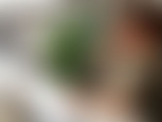 Lady at work feeling tired sat at a desk