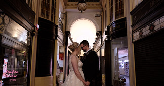 Bride and Groom standing.