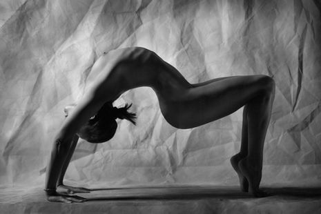 Artistic nude yoga portrait inspired by natural body contours