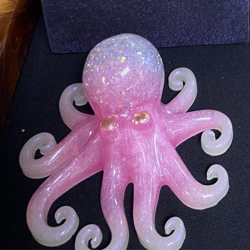 small resin octopus with embellishments in the design