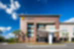 Branded exteriors at national hotels offer instant recognition and a promise of consistency—welcoming travelers with the comfort of familiarity.