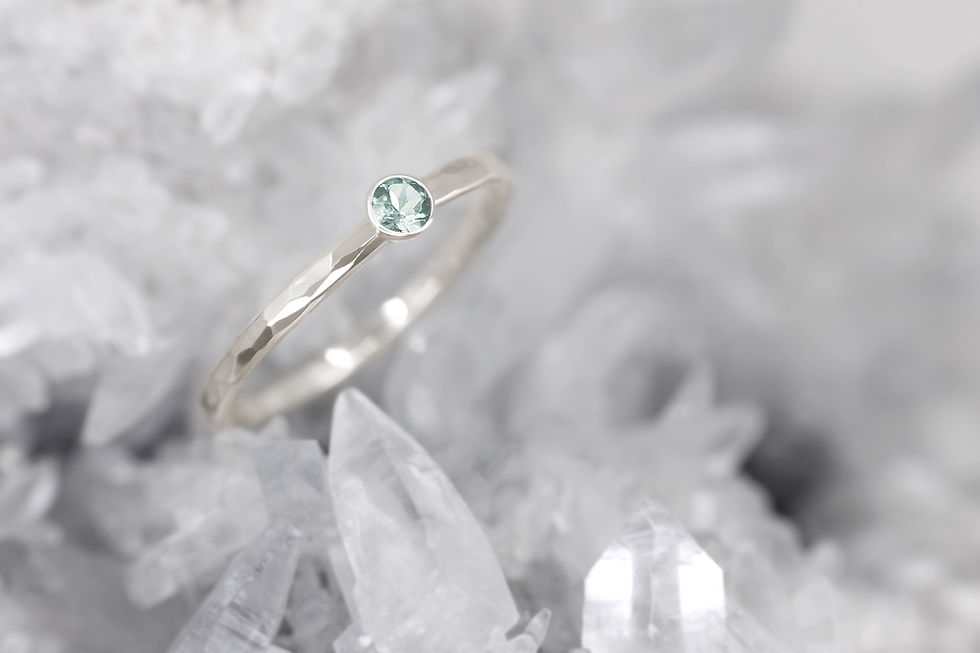 Thumbnail: Engagement Ring Made in FairTrade White Gold and Ethical Australian Light Teal Sapphire with Hammered Texture