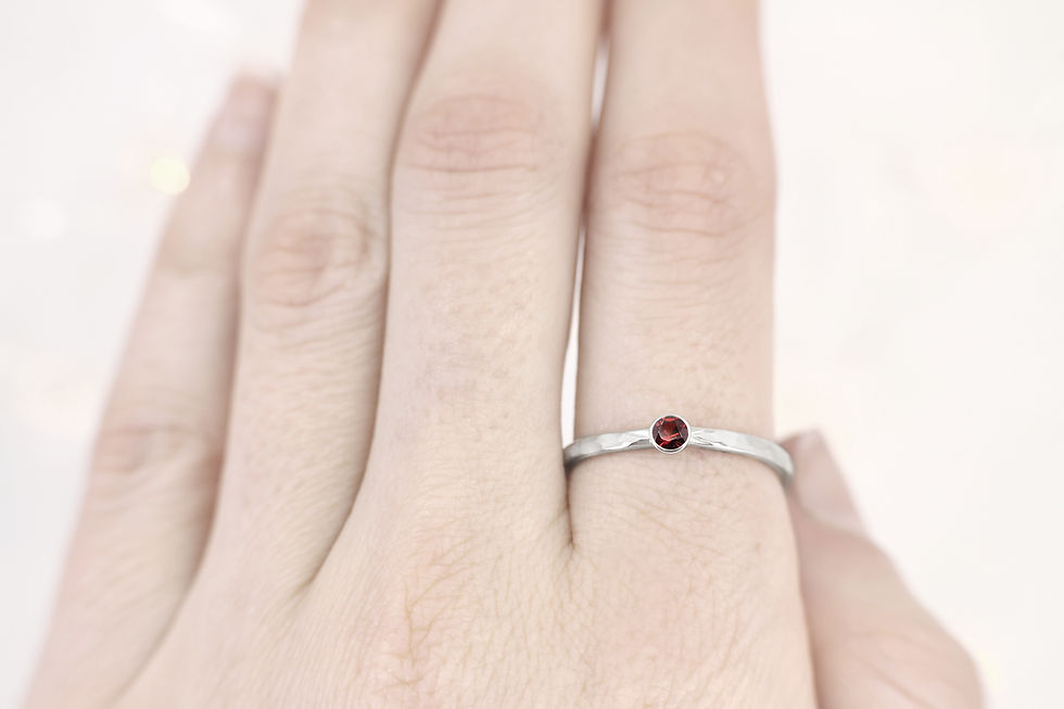 Thumbnail: FairTrade White Gold and Ethically Sourced Garnet Engagement Ring