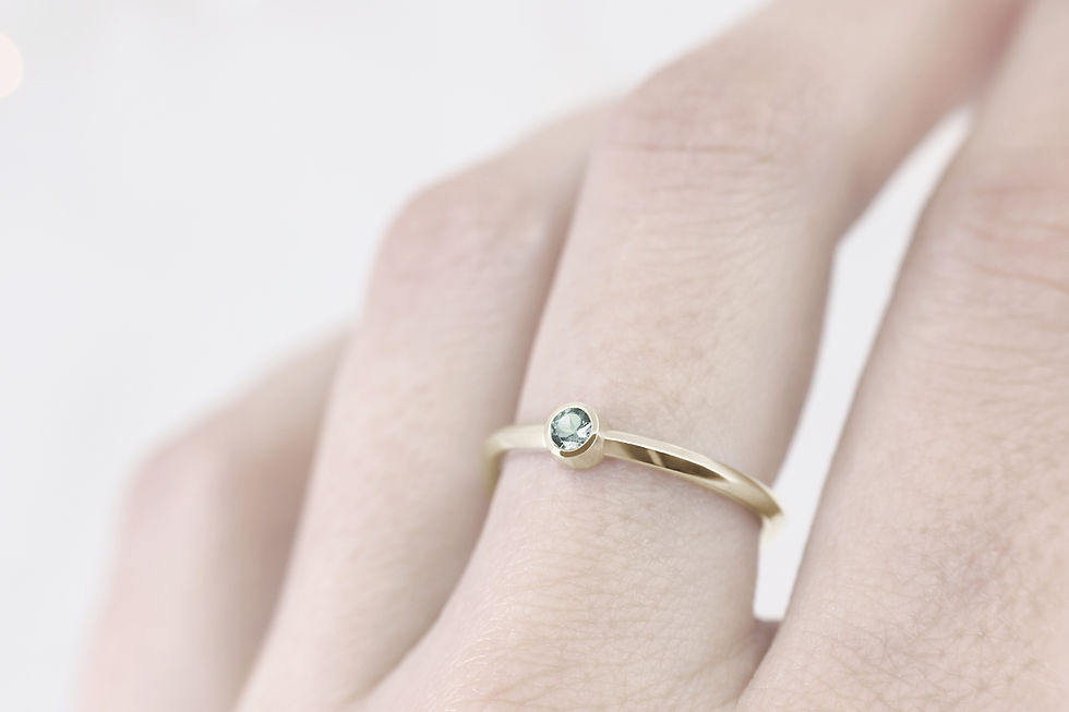 Thumbnail: Fairtrade Yellow Gold Solitaire Engagement Ring with Ethically Sourced Light Teal Australian Sapphire