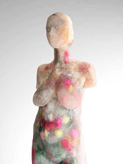 Mariia Kulikovska, Figure with Tulips, epoxy resin, tulips, herbs, 180 × 50 × 60, 2025