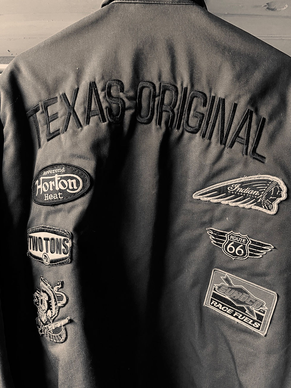 the Dickies jacket Asphalt Canvas Custom Art had custom made for me with all my patches and the name Texas Original