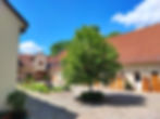 Ein Blick in den Innenhof der Hozmühle Kämmeritz, christliche Suchthilfe e. V. Der Dreiseitenhof wur