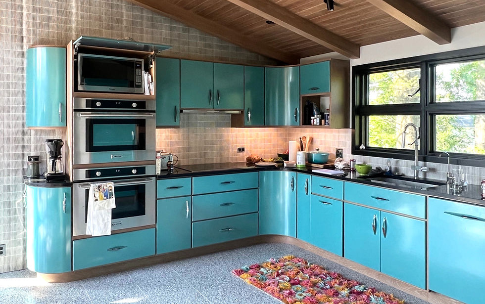 Blue metal kitchen cabinets in mid century modern kitchen