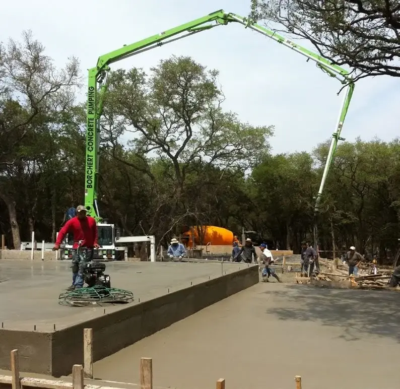 Concrete being poured by Paradise Custom Homes.
