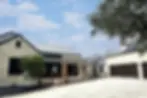 Driveway and Garage of a Custom Home in Bulverde texas.