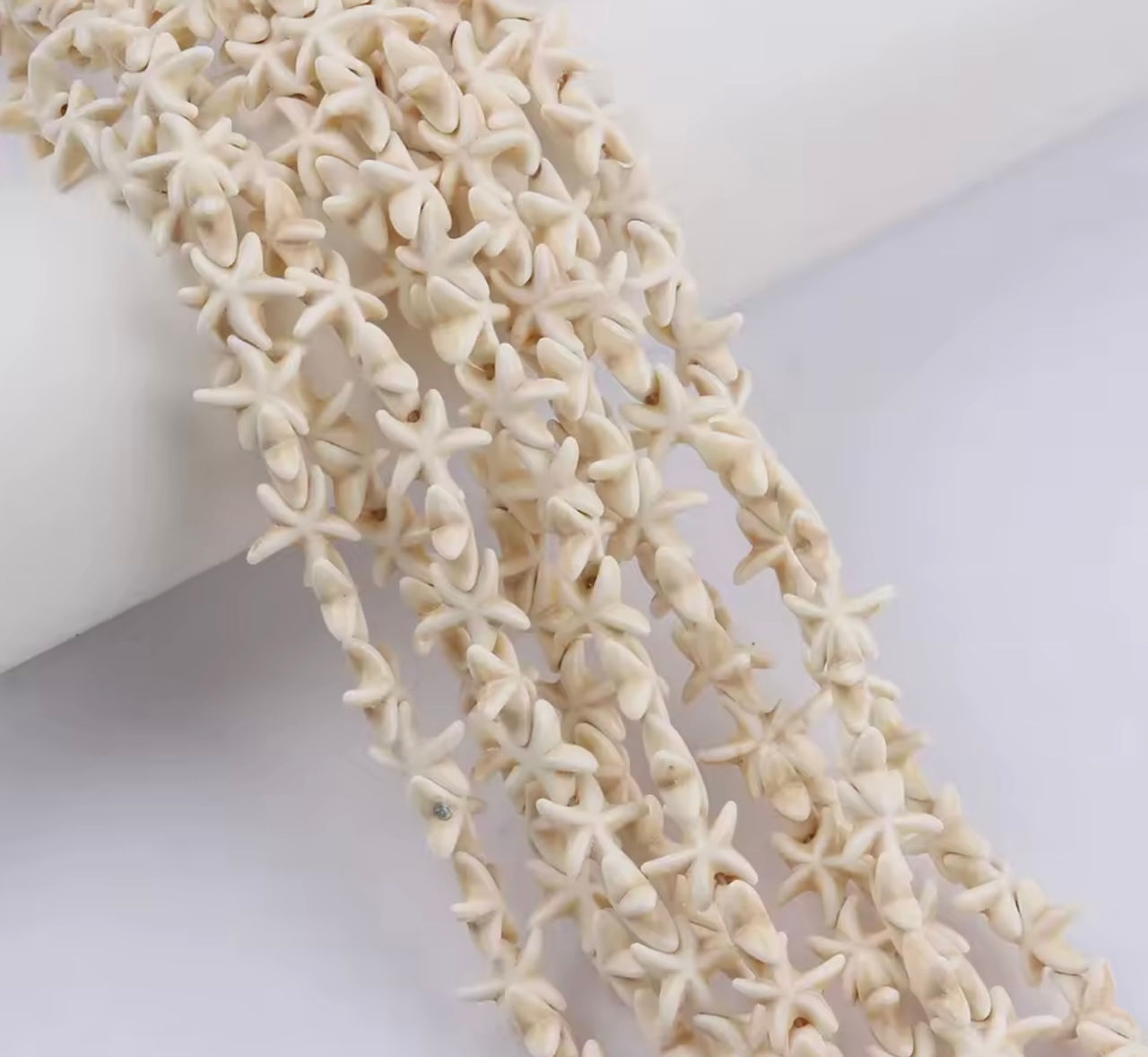 Estrella turquesa blanca 