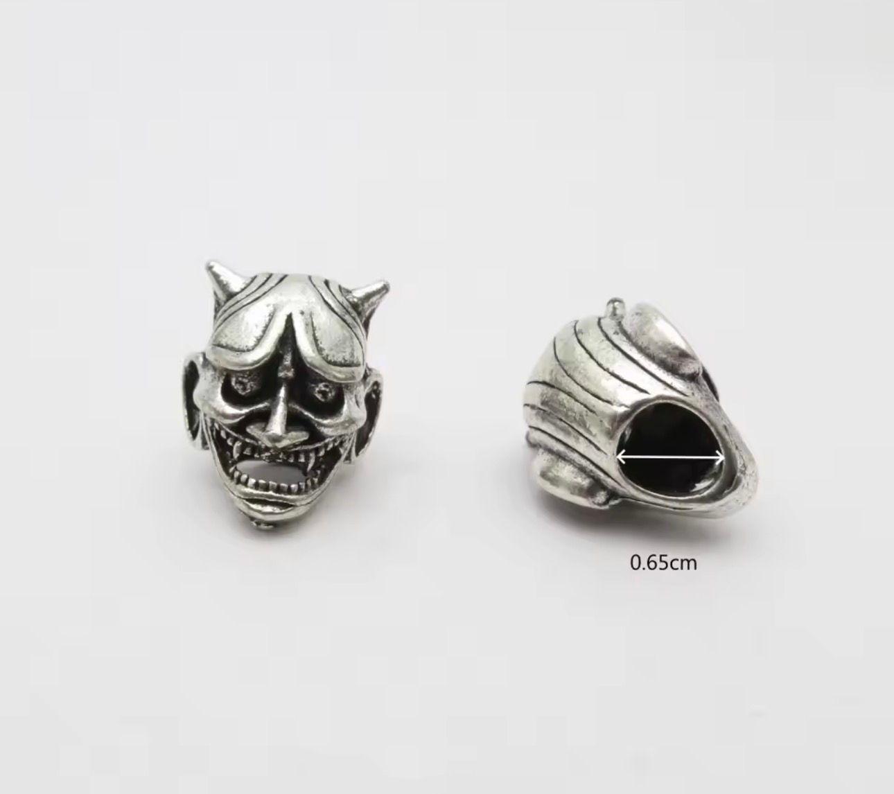 Oni de metal por bolsa 