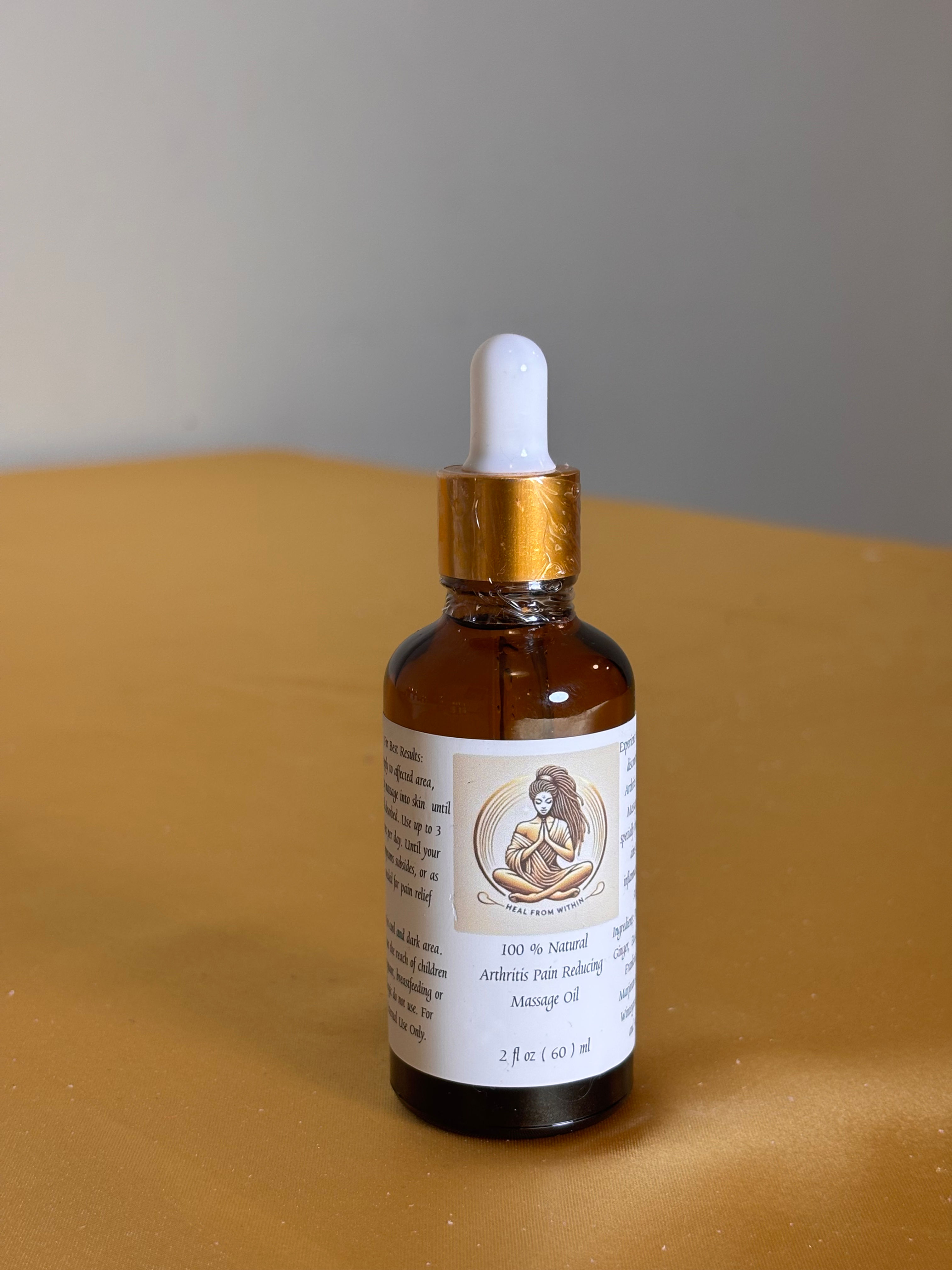 "Soothing oil blend for relieving arthritis pain using natural essential oils."