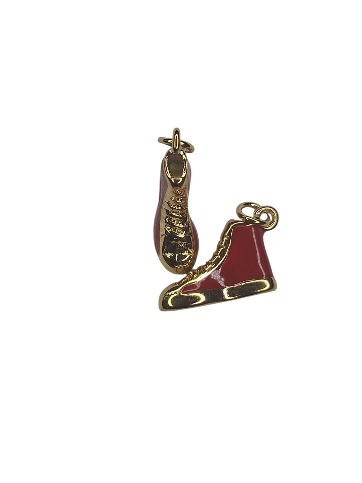 Red and gold enamel high-top shoe and ballet slipper charms.