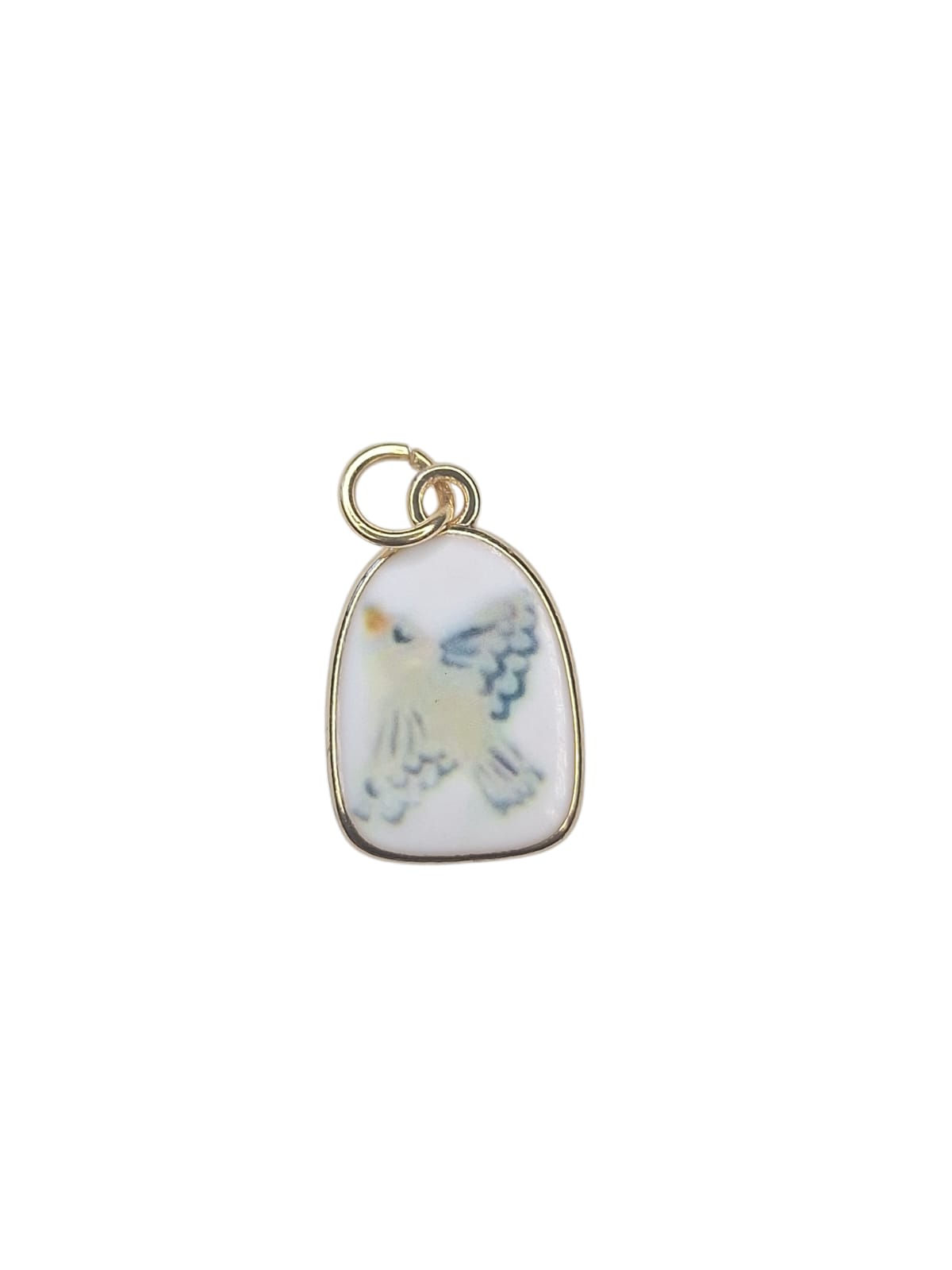 Gold-trimmed enamel pendant with abstract blue and yellow design.