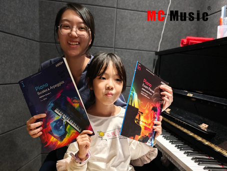 Our teacher having piano lesson.