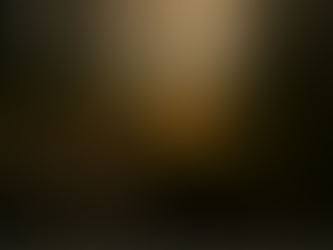 Candle on a tree stump glowing in a misty frost-covered autumn woodland surrounded by bare trees and fallen leaves.