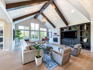 ranch home great room with vaulted beamed ceiling